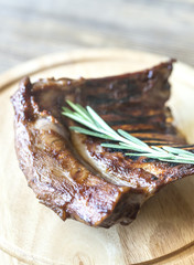 Canvas Print - Grilled lamb ribs on the wooden board