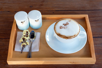 Wall Mural - Set of coffee, cappuccino in white coffee cup on wood table, coffee time