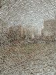 © Adrian Cotiga/Stocksy - Cracked broken destroyed glass damaged window background; background for mobile