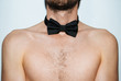 © Susana Ramírez/Stocksy - Man neck with bow tie