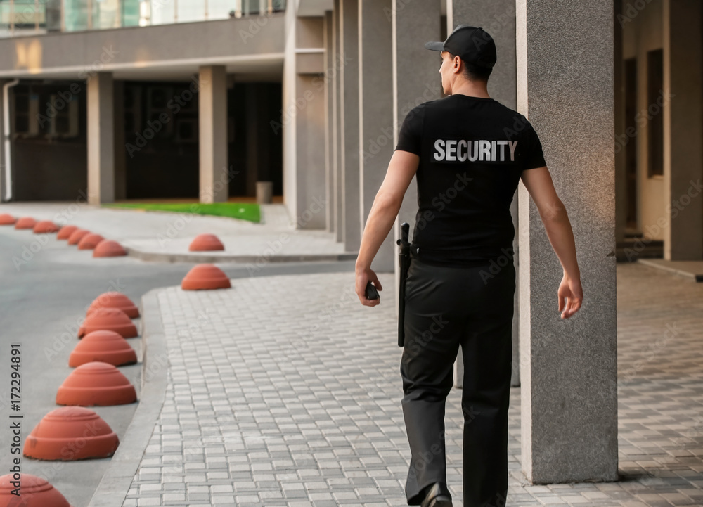 Male security guard, outdoors