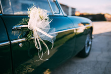 Close Up Of Classic Car With Wedding Decoration
