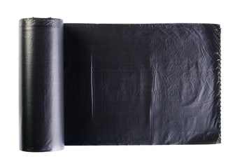 Black plastic polyethylene garbage bag rolled and isolated on white background