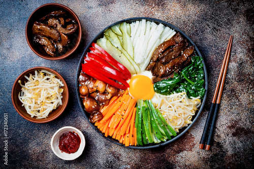 Fotografie, Obraz Bibimbap, traditional Korean dish, rice with vegetables and beef