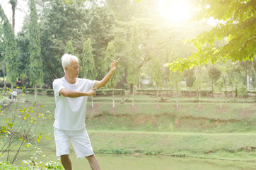 Senior people practicing tai chi outdoor