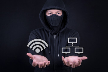 Wall Mural - Hacker digital thief open palm gesture with wifi and network icon. Internet security and cyber attack concepts with working space
