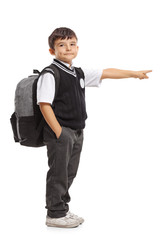 Poster - Schoolboy with a backpack pointing