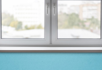 Close-up part of the clean white window and sill in a room