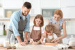© Africa Studio - Family cooking in kitchen. Cooking classes concept