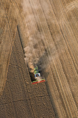 aerial view of the combine on harvest fields