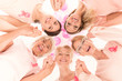 © Photographee.eu - Smiling women with pink ribbons