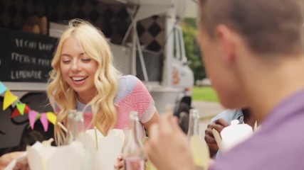 Poster - happy multiracial couple eating wok at food truck