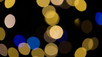 Wall Mural - blurred chtistmas lights over dark background