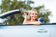 © Syda Productions - happy young woman with convertible car key