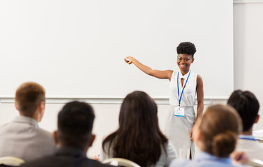 Wall Mural - group of people at business conference or lecture