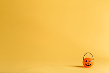 Halloween Pumpkin Decoration On A Yellow-orange Background