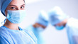 © lenets_tan - Team surgeon at work in operating room.