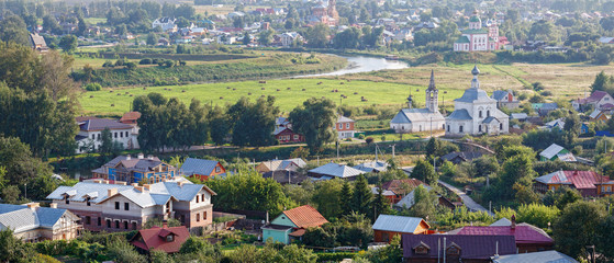 Wall Mural - Beautiful cityscape. Aerial view of the old Russian town of Suzdal. Golden Ring, Vladimir region, Russia