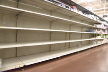 Empty Shelves In Store In Humble, Texas USA. Supermarket With Empty Shelves For Goods.