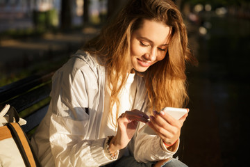 Sticker - Close up image of smiling brunette woman in autumn clothes