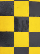 A Background Black And Yellow Checkerboard