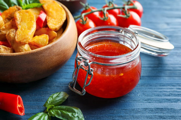 Sticker - Glass jar with chili sauce on kitchen table