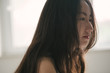 © Maa Hoo/Stocksy - Portrait of young asian girl
