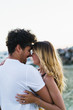 © Kike Arnaiz/ADDICTIVE STOCK - Happy couple having fun on beach