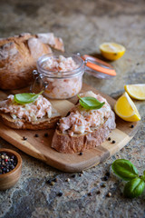 Wall Mural - Salmon spread with cream cheese and onion on whole grain bread slices