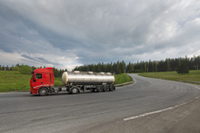 Gas Tank Truck Driving On A Cross-country Road