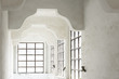 © Lawren Lu/Stocksy - Old white room with windows