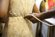 © PARTHA PAL/Stocksy - Adjusting Indian traditional dress