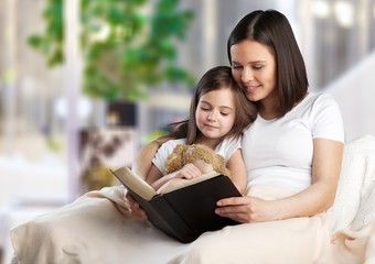 Poster - Mom and child read book.