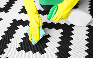 Wall Mural - Woman cleaning carpet in room