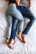 © Jovo Jovanovic/Stocksy - Couple relaxing in bed -