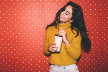 Young Woman Over A Red Polka Dots Wallpaper