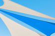 © Robert Lang Photography/Stocksy - Blue and white shade sails