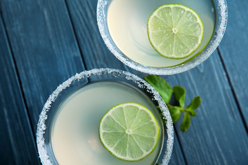 Canvas Print - Glasses of lemon drop martini on table, closeup