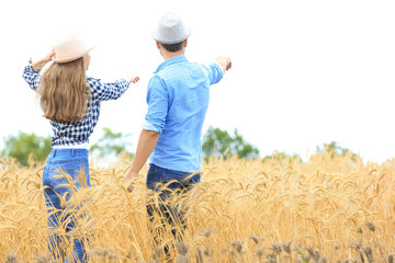 Poster - Two farmers standing in wheat field