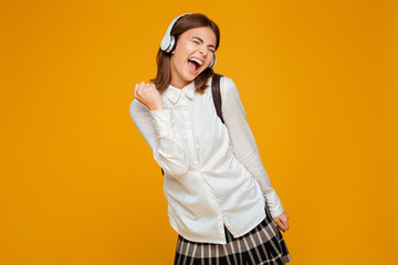 Sticker - Portrait of a cheerful teenage schoolgirl in uniform