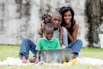 portrait of happy family in park