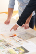 © Photographee.eu - Agent showing property plan