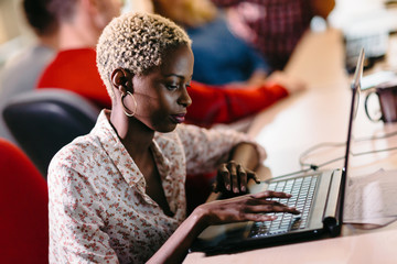 Portait of software designer working in office
