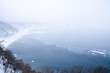 冬の知床　雪で霞む流氷に覆われたオホーツク海　ウトロ・北海道