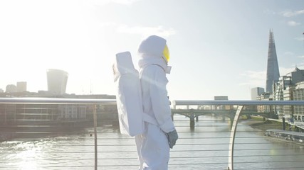 astronaut exploring london, looking out at the view of the city