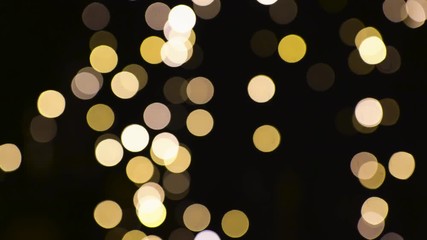 Wall Mural - blurred chtistmas lights over dark background