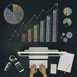© CACTUS Blai Baules/Stocksy - Workspace with various charts on chalkboard