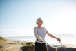© Rob and Julia Campbell/Stocksy - Vibrant mature woman enjoying herself on a bicycle
