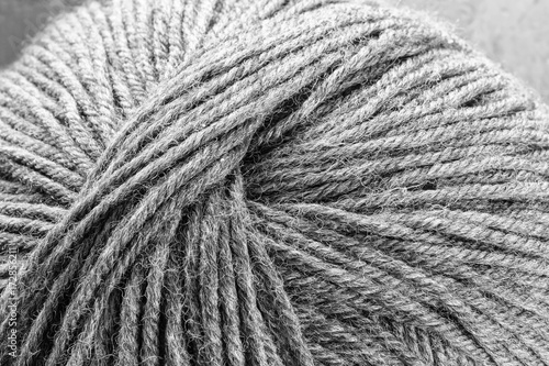 Fotografie, Obraz A ball of woolen yarn.- in black and white.