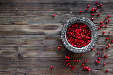 Poster - Food set with various berries for making spices and mortar wooden background top view mockup